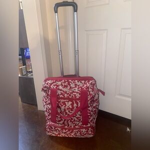 Red and White Patterned Rolling Luggage